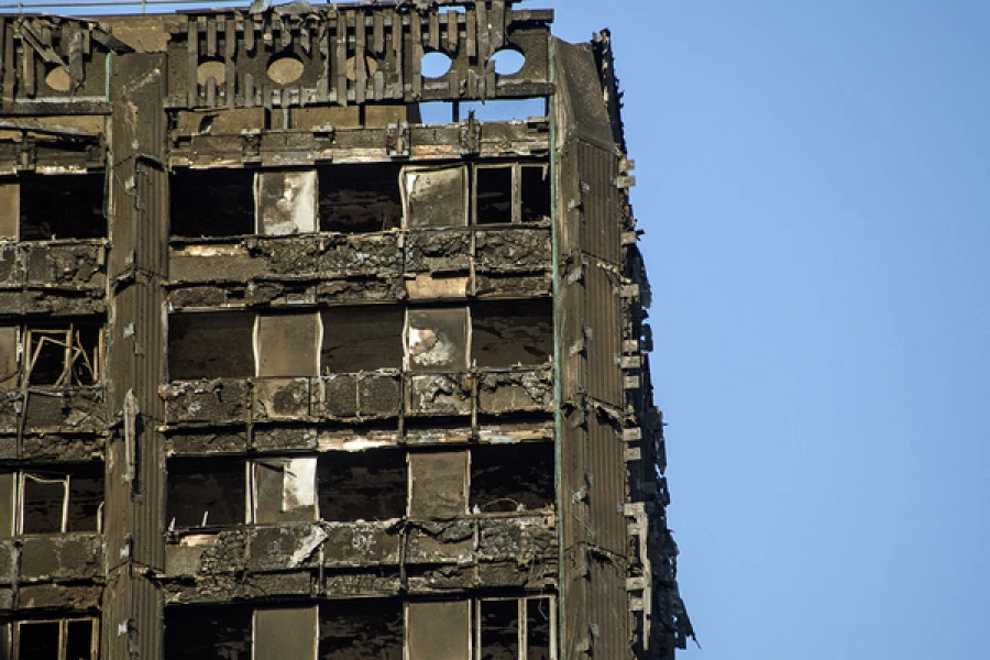 Tower with Grenfell-style cladding denied removal funding as it is 64cm too short